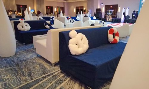 Velvet lounge furniture setup for Tampa lounge furniture rentals featuring slip-cover sofas and elegant event seating.