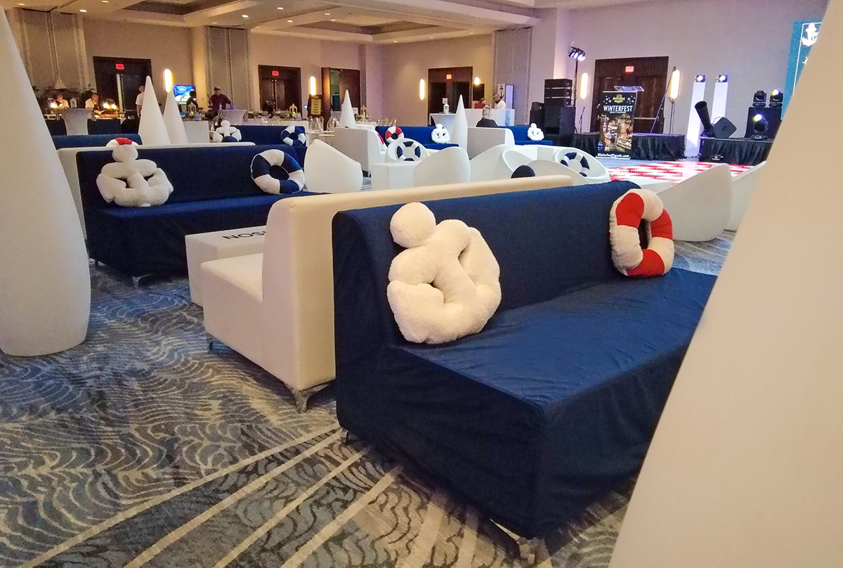 Velvet lounge furniture setup for Tampa lounge furniture rentals featuring slip-cover sofas and elegant event seating.